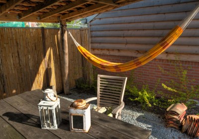 Natuurlijke terrasoverkapping en Hangmat